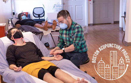 Two patients receiving acupuncture at Boston Acupuncture Project.